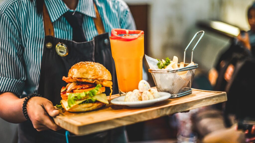 health and safety in a restaurant image of food being served 