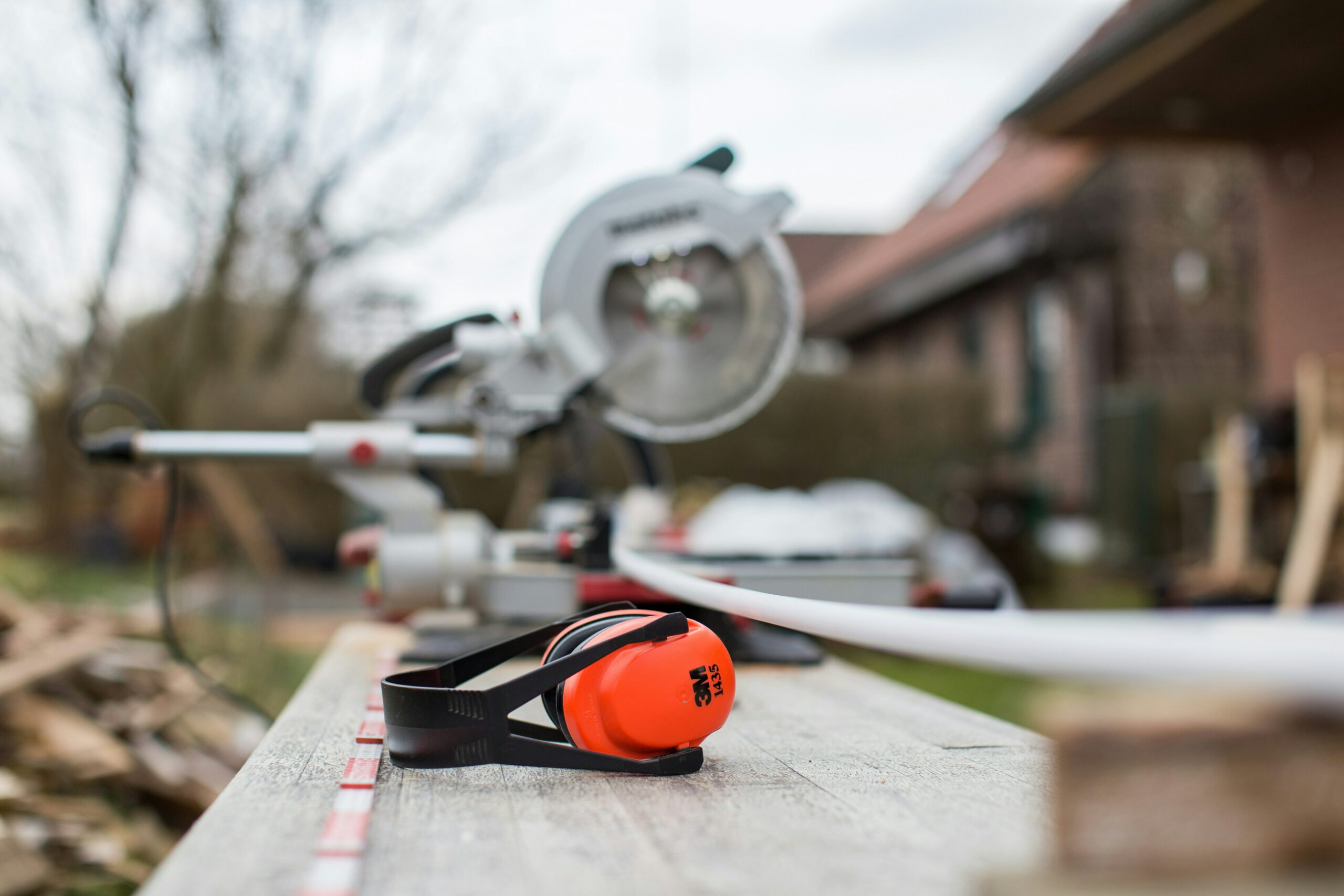 ear defenders as part of PPE used to uphold health and safety regulations