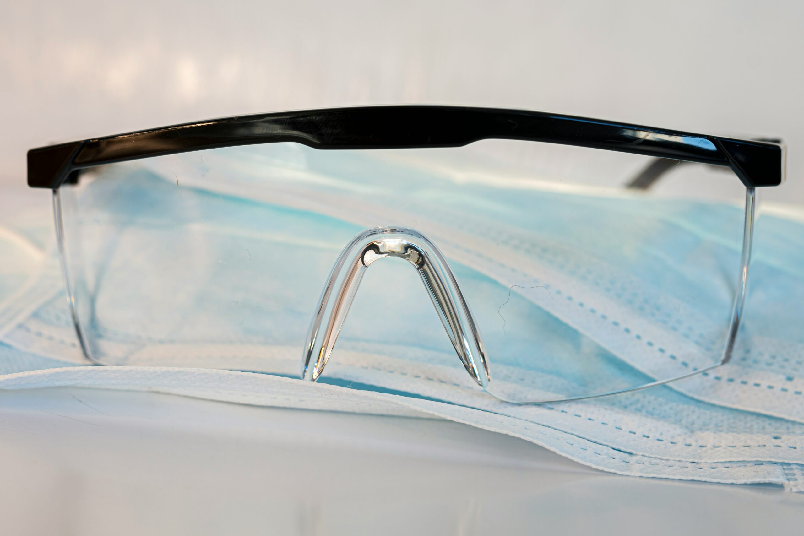 plastic goggles used in manufacturing to protect workers eyes